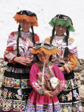 Portrait of Three Local Peruvian Girls in Traditional Dress  Looking at the Camera  Cuzco  Peru