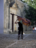 Musician Carrying Double Bass Along Cobbled Street to Plaza Mayor  Trinidad  Cuba