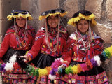 Portrait of Three Smiling Local Peruvian Girls in Traditional Dance Dress  Peru