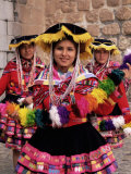 Portrait of Three Local Peruvian Girls in Traditional Dance Dress  Peru