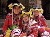 Portrait of Three Smiling Peruvian Girls in Traditional Dance Dress  Peru