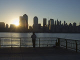 Fisherman Fishing from a Jersey City Pier at Dawn Facing the Manhattan Skyline  Jersey City