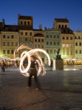 Street Performers in Front of Houses  Restaurants and Cafes at Dusk  Warsaw  Poland