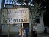 Semuc Champey Sign in Town of Coban  with Local Kids  Guatemala  Central America