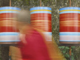 Buddhist Monk Passing Prayer Wheels  Mcleod Ganj  Dharamsala  Himachal Pradesh State  India  Asia