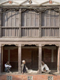 Three Old Men Watch the World Go by on a Street in Bhaktapur  Kathmandu Valley  Nepal  Asia