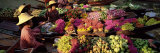 Women Market Traders in Boats Laden with Fruit and Flowers  Thailand