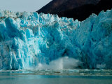 Blue Ice Calving Along Glacier Front of South Sawyer Glacier  Alaska