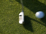 Close View of a Putter Hitting a Golf Ball  Groton  Connecticut