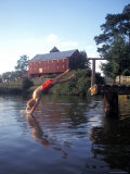 Child Jumps into a Pond on a Farm in Comus  Maryland