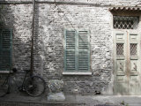 Bicycle Leaning against a Stone House in Ravenna  Italy