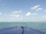 Bow of Blue Boat Pointing Towards Islands in Turquoise Water  Ambergris Caye  Belize