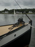 Bow of a Boat with a Sailboat in the Background on the Mystic River  Connecticut