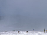 Backpackers Climbing Mount Rainier in the Snow  Washington