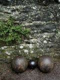 Cannon Balls at the Base of a Stone Wall at Brolio Castle  Tuscany  Italy