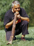 Aboriginal Elder Playing the Diggeridoo  A Wind Instrument  Australia