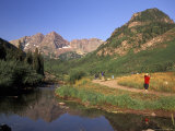 Hikers Walk Along a Trail in Maroon Bells Wilderness Area in Colorado