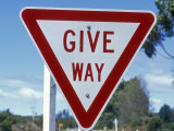 Give Way Sign on the Side of the Road
