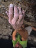 Hand Reaches Up for a Small Hold on a Rock Climb in Wyoming