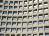 Geometric Grid of Windows Reflects the Sky