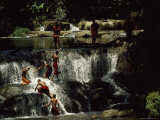 Gently Sloping Waterfalls Surrounded by Rich Vegetation in Which Eight Novice Monks Are Bathing