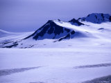 Mountain Tops Peek Out over Harding Ice Field  Alaska