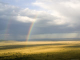 Rainbows Form over the Serengeti Plains  Tanzania