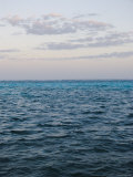 Puffy Clouds on Horizon with Caribbean Turquoise Blue Ocean Foreground  Ambergris Caye  Belize