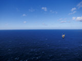 Massive Oil Rig Platform Dwarfed by Bass Straits Vast Blue Ocean  Australia