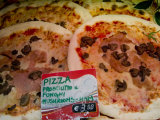 Pizza Displayed for Sale at a Market in Venice  Italy