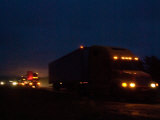 Semi Trucks at Night on the Shoulder of I-80