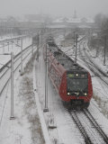 One Red Train on Snow Day  Copenhagen  Denmark