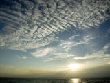 Setting Sun over the Sea with Cloud Filled Sky  Belize