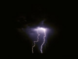 Twin Lightening Forks Slam into a Salt Pan Illuminating the Desert