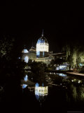 The Royal Exhibition Building Lit Up at Night  Reflecting in the Lake  Australia