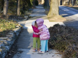 Sisters Show their Love in a Big Greeting Hug