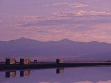 Trucks on the Highway Reflected in Great Salt Lake  Utah
