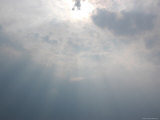 The Sun's Rays Peek Through Clouds  Ventura  California