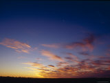 Specactular Sunset and Cloud Formation over a Vast Desert Plain  Australia
