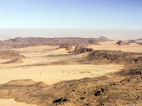 The Far Reaches of the Ennedi Mountains and the Dust-Filled Horizon  Chad
