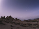 Stars in Sky Moving under Timed Exposure at Night  California