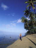 Woman Walking Along Tropical Beach  Hawaii