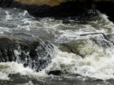 Waves Washing over Rocks at the Bank of a River  Groton  Connecticut