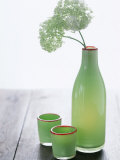 Green Bottle with Flowers and Green Glasses
