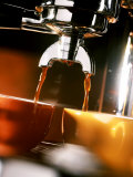 Two Cups Under a Coffee Machine