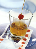 Manhattan in Whisky Glass  Cocktail Cherry on Cocktail Stick
