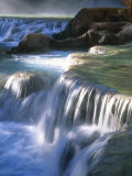 Water Flowes over Travertine Formations Below Havasu Falls