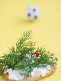 Miniature Footballer Fighting His Way Through Forest of Dill