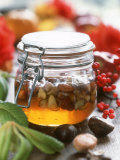 Honey with Chestnuts and Almonds in Jar