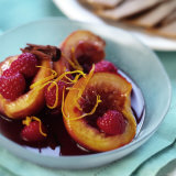 Peaches with Raspberries in Red Wine and Cinnamon Sauce